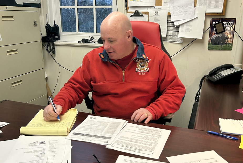 Fire Chief Gilliland at his Desk