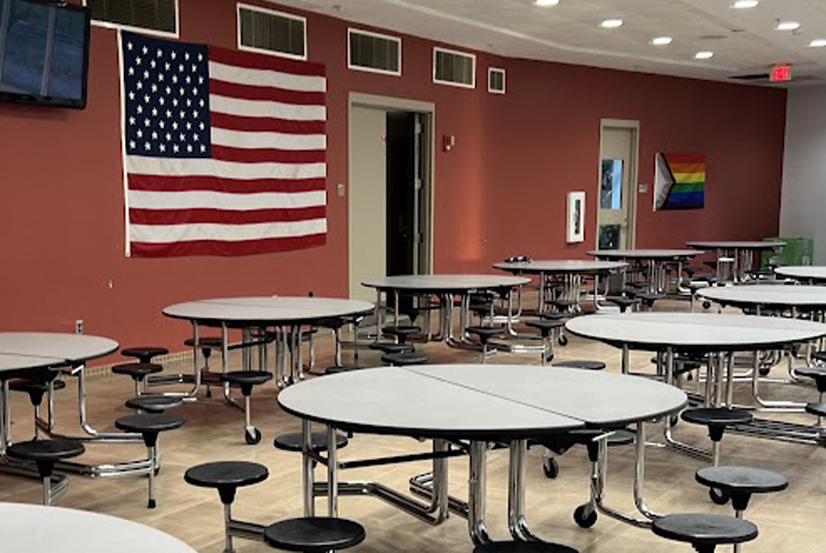 MHS cafeteria with BLM flag folded on table
